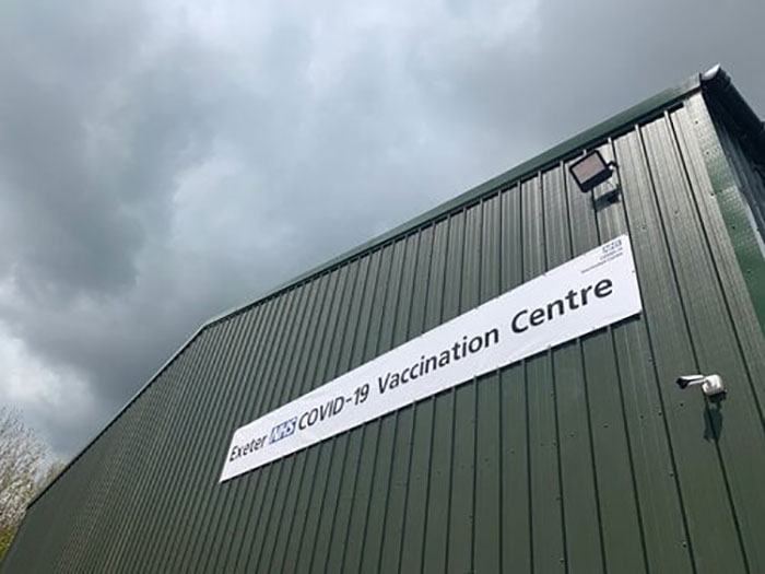 The sign outside of the COVID-19 vaccination centre that AJN supplied steel for