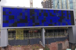 The Manchester media wall with the screen installed, showing the size of the project