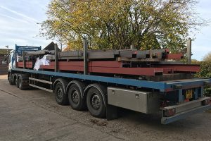AJN trucks delivering the steel the Northend project