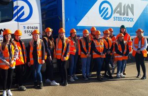 AJN celebrates International Women’s Day with a picture of a lot of the Kentford site female employees