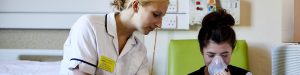 A nurse and patient work together supported by AJN Steelstock